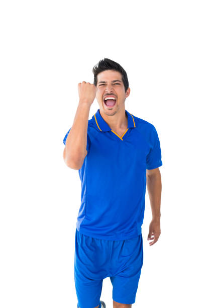 istock Happy football player in blue celebrating 843445932