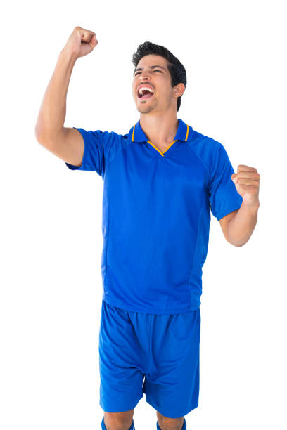 istock Happy football player in blue celebrating 843445942