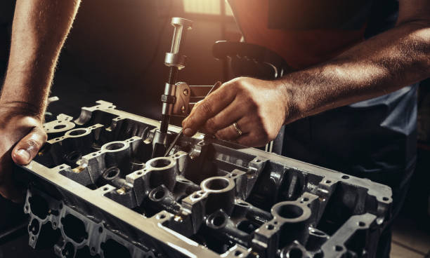 Repairing V10 engine in auto repair shop Repairing V10 engine in auto repair shop diesel fuel stock pictures, royalty-free photos & images