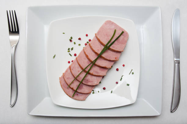 istock roasted turkey sliced on a white plate 843462828