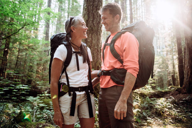 istock Mature Couple Backpacking in Forest 843466296
