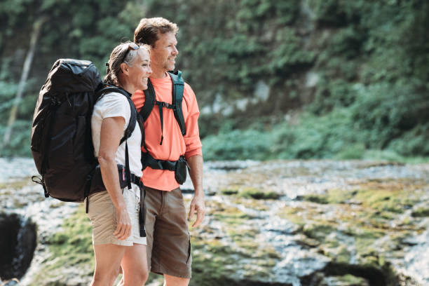 istock Mature Couple Backpacking in Forest 843466596