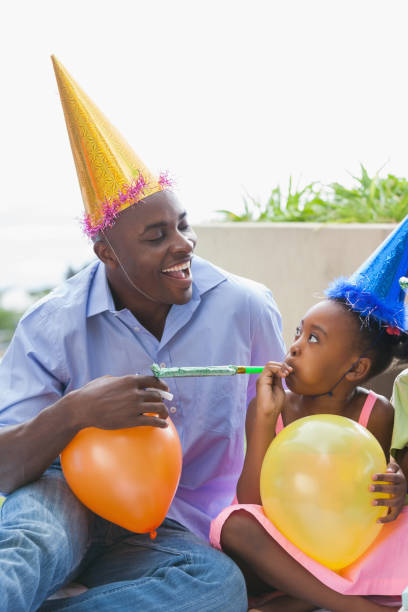 istock Father and children celebrating a birthday together 843474062