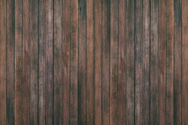 istock Vintage surface wood table and rustic grain texture background. Close up of dark rustic wall made of old wood table planks texture. Rustic brown wood table texture background template for your design. 843484490