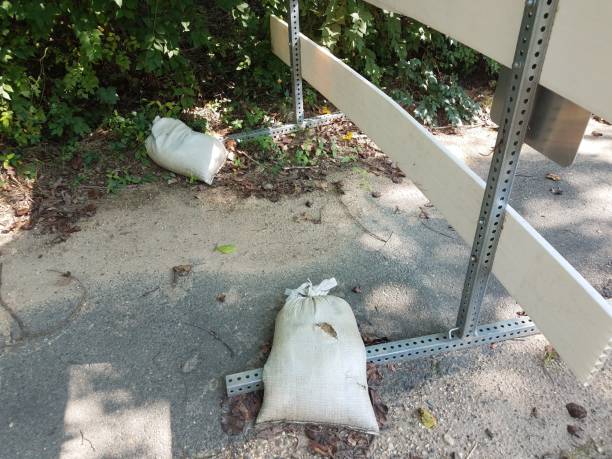 istock sandbags holding down a sign 843484766