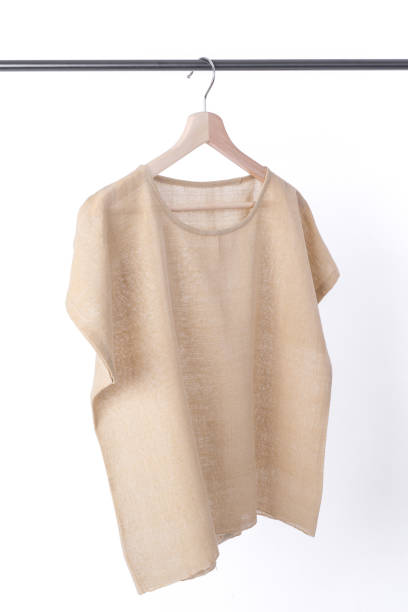 istock cotton beige stripe woman blouse on white background. 843485312
