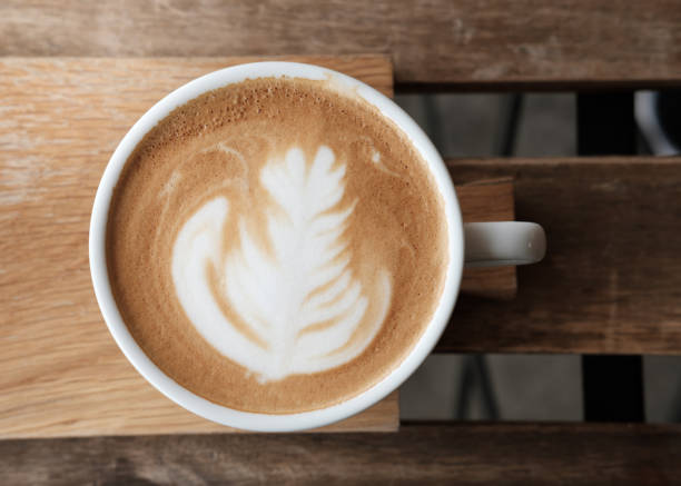 istock A cup of coffee put on wooden board 843491592