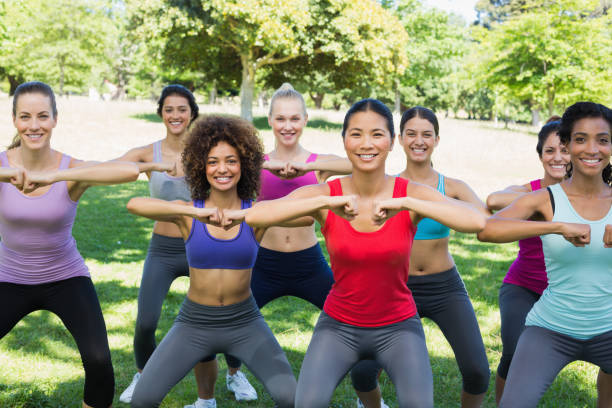 istock Happy women warming up in park 843498804