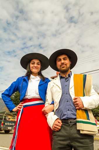 Panguipulli, Chile - September 17, 2014: A couple of Huasos at the main avenue of the town for the commemoration of the Independence of Chile.