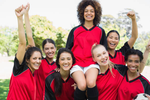 istock Successful female soccer team at park 843499386