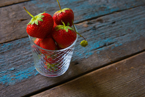 istock Strawberry on a wooden board in rustic style 843509702