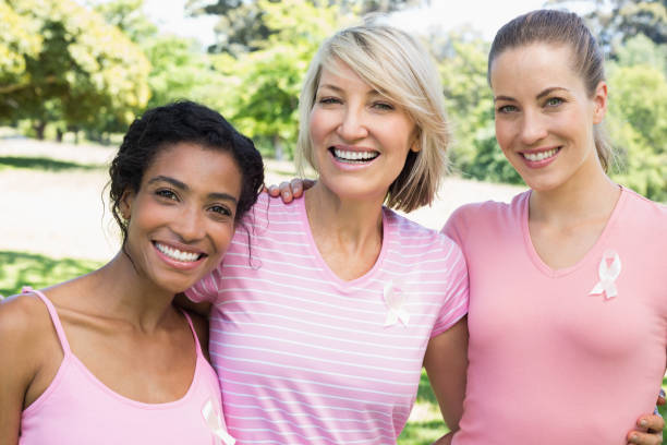 istock Multiethnic volunteers participating in breast cancer awareness 843514032