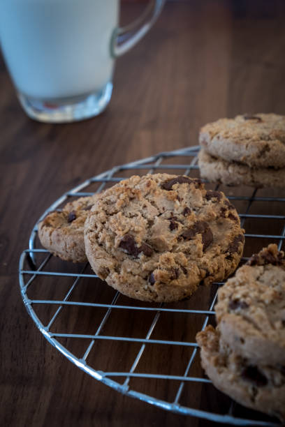 istock Chocolate cookies on wooden table. 843514368