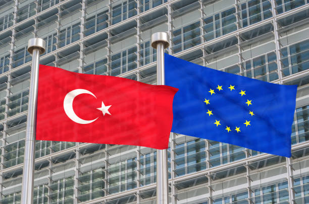 Turkey and Europe flags waving in the wind (3D rendered) stock photo