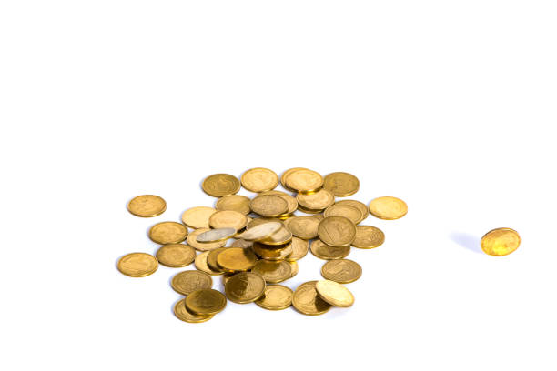 istock Falling gold coins. Money on a white background. shallow focus. 843514846