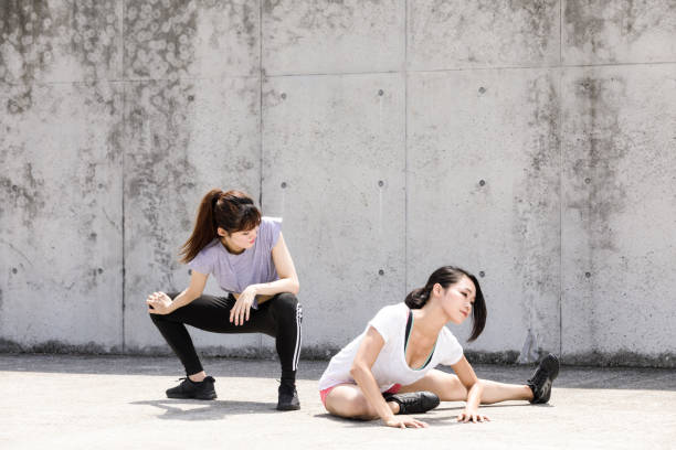 istock Two sporty Japanese women are taking a break between exercises 843517620