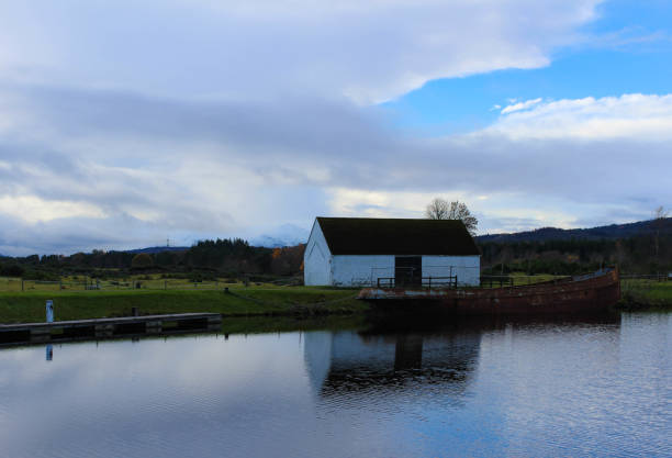istock Stucture with boat on a Loch in the Scottish Highlands 843518212