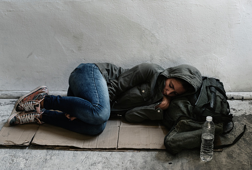 Homeless sleeping on the sidewalk