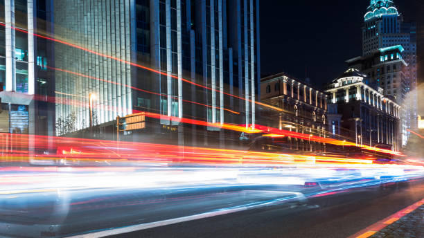 istock traffic light trails at night in Shanghai, China 843526574