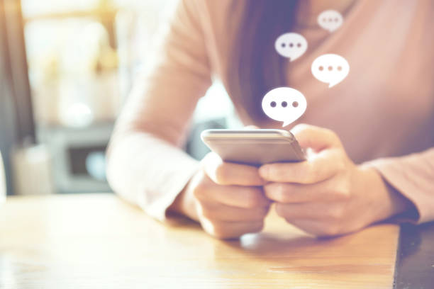 istock women's hand typing on mobile smartphone, Live Chat Chatting on application. 843529134
