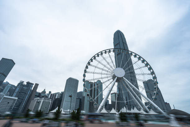 istock Statue square buildings against sky in Hong Kong,China 843529264