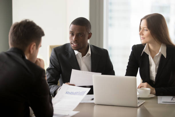 istock Multinational business partners meeting in office 843533946