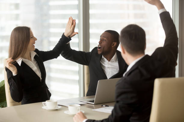 istock Excited business partners celebrating success 843533970