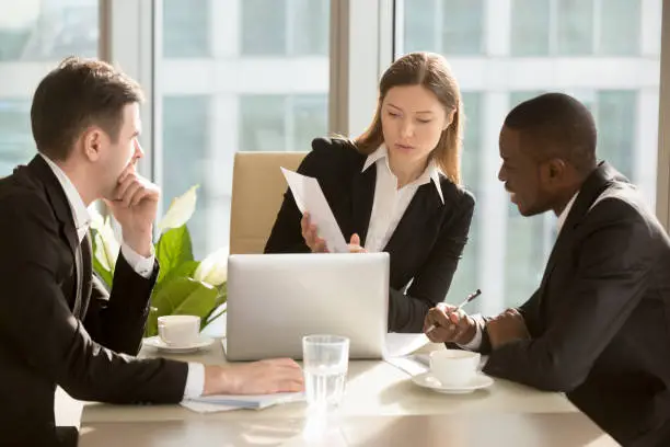 Photo of Female CEO explaining deal financial perspectives