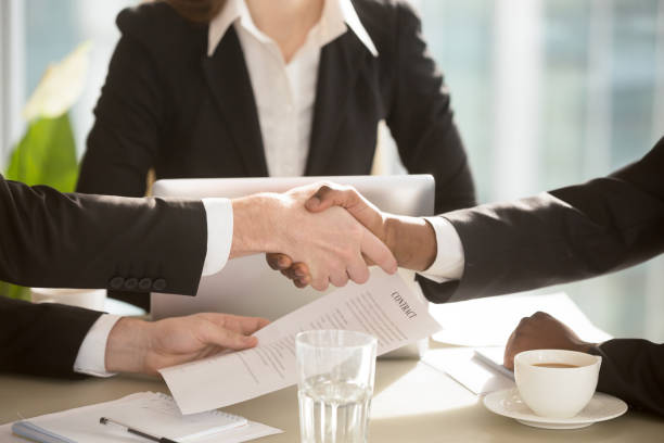 istock Handshake between partners after making good deal 843534160
