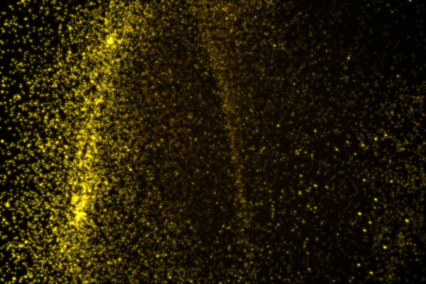 istock Abstract background made of yellow glowing particles 843538462