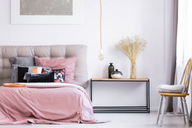 istock Modern bedroom with orange chair 843542522