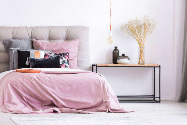istock Pastel pink bedroom with flowers 843542672