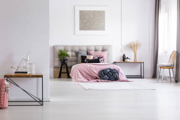 istock Spacious bedroom with silver painting 843542676