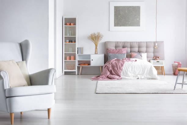 istock Grey armchair in cozy bedroom 843543064