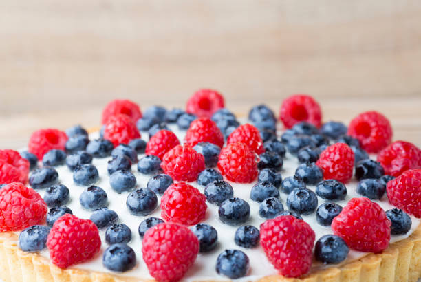 istock Cake with blueberries and raspberries. Confectionery product. 843548610