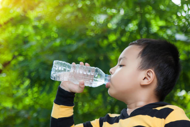 istock Children are drinking water in the morning. 843549580