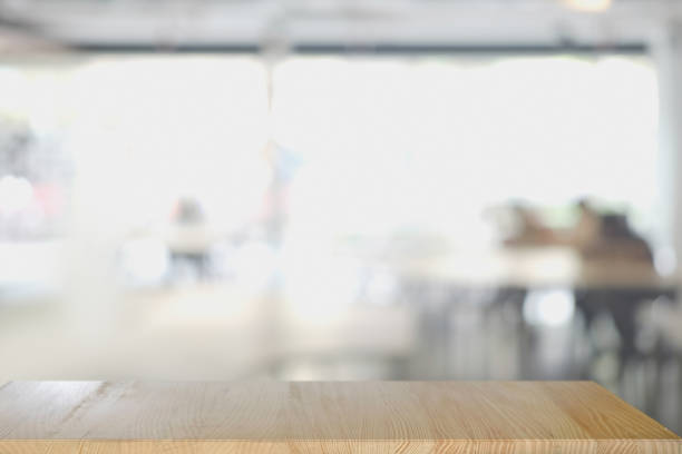 istock Space of wood table platform over atmosphere around office blur background for product presentation montage. 843558098