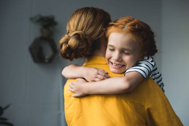 istock mother and daughter embracing 843561910