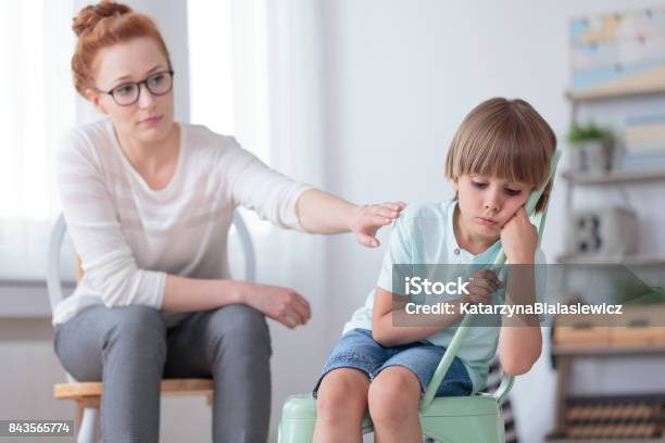 Sad Autistic Boy And Psychotherapist Stock Photo - Download Image Now - Child, Autism, Special Education