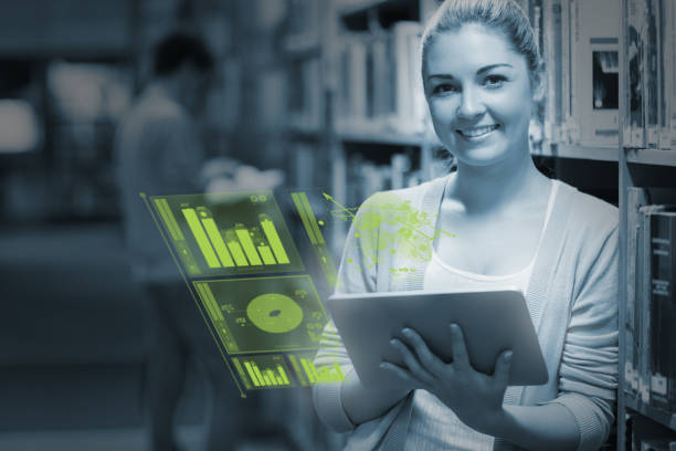 istock Smiling student analysing figures on her futuristic tablet 843565848