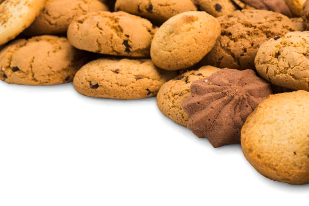istock Lots of cookies and biscuits at white with copy space 843566020