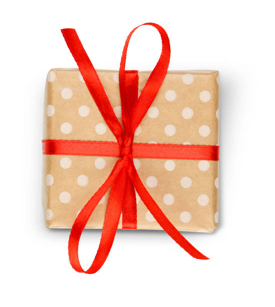 istock Christmas holiday gift box in spotted paper isolated on white 843567130