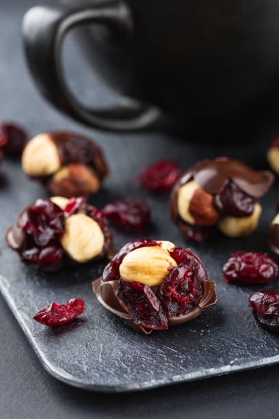 Hazelnut and cranberries in chocolate