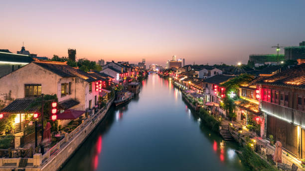 Chinesse Canal The night view of Grand Canal in wuxi,jiangsu china. wuxi photos stock pictures, royalty-free photos & images