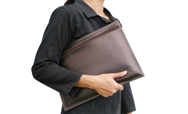 istock Business woman with leather bag isolated on white background. 843578182