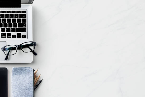 Top view of modern office marble desktop background
