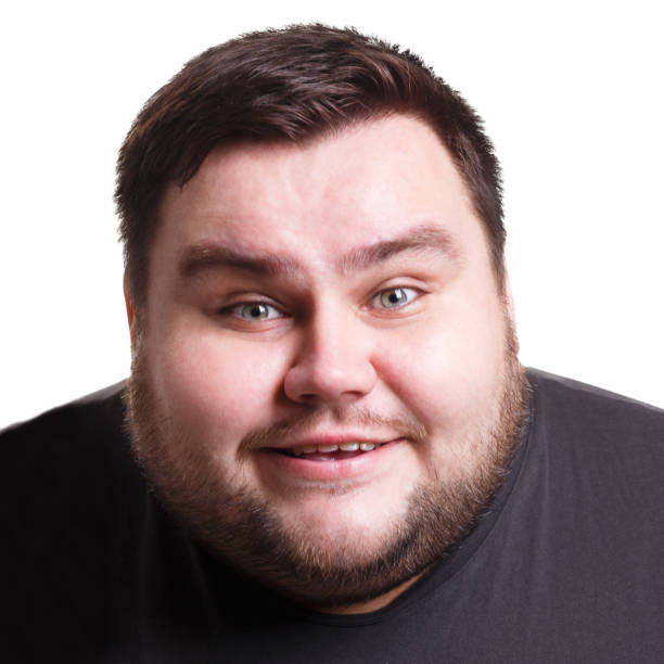 Pleasant news. Excited man expressing plesant on face, smiling on white isolated studio background, portrait