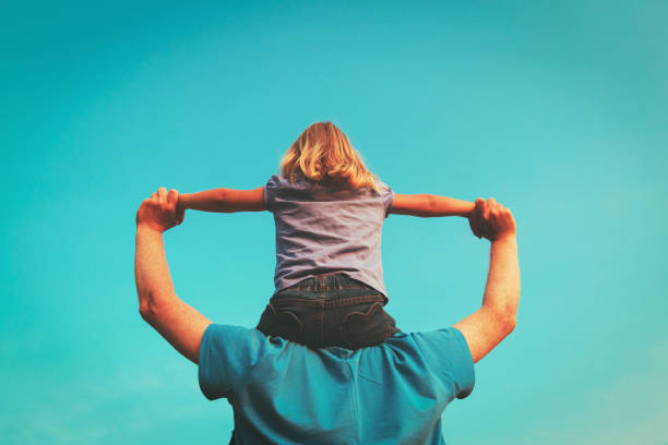 istock Father and little daughter play at sky 843583466