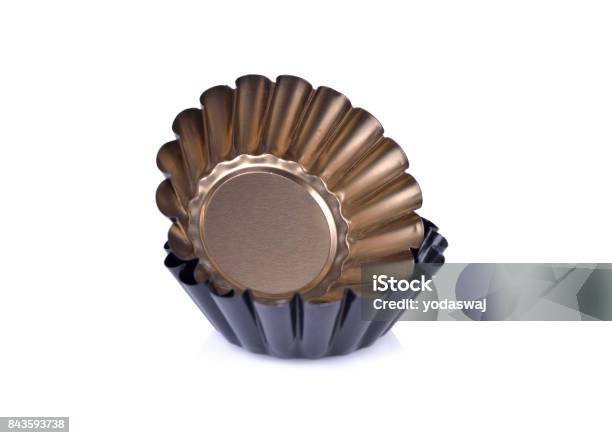 Gold And Black Mini Tart Tins On White Background Stock Photo - Download Image Now - Bakery, Cake, Close-up