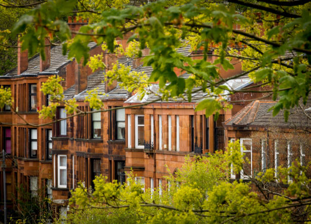 Glasgow Scotland Red Sandstone Tenements Row of Red Sandstone Tenement Flats Southside of Glasgow, Scotland, UK glasgow scotland stock pictures, royalty-free photos & images